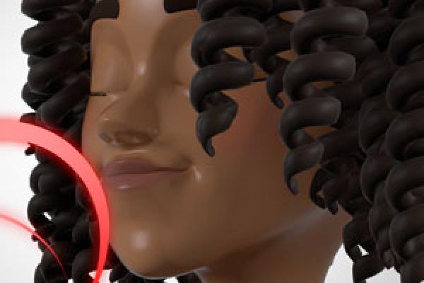 A woman breathing through her nose to smell a scent