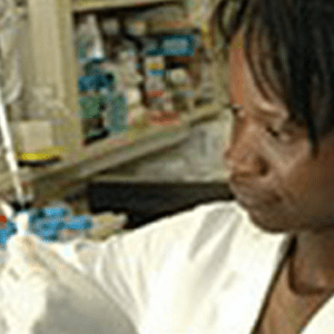 woman of color doing research in a lab